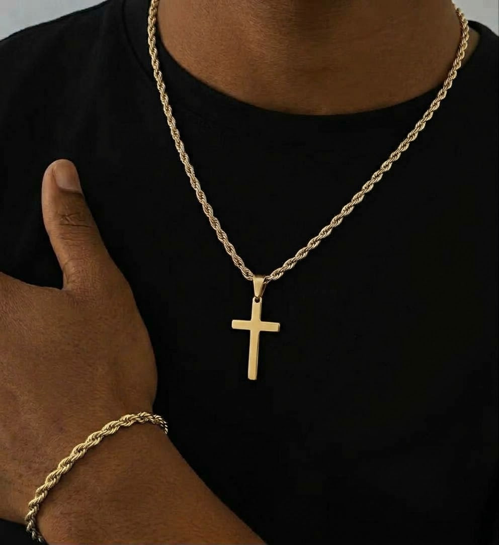Gold tone rope cross necklace and bracelet worn together