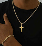 Gold tone rope cross necklace and bracelet worn together