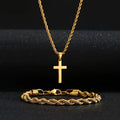 Gold tone rope chain cross necklace and bracelet on a dark background