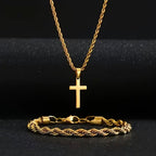 Gold tone rope chain cross necklace and bracelet on a dark background