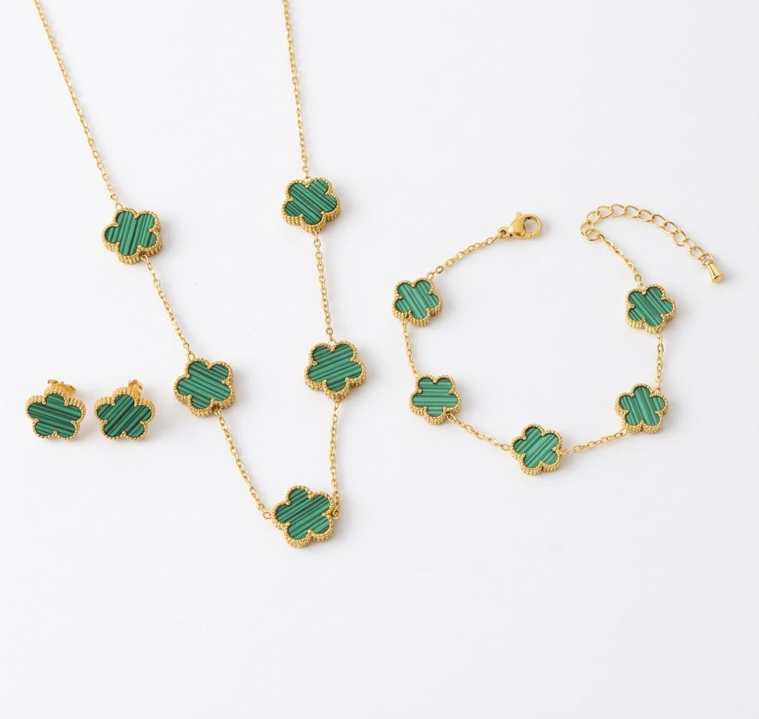 Green clover necklace, bracelet and stud earrings with gold tone settings