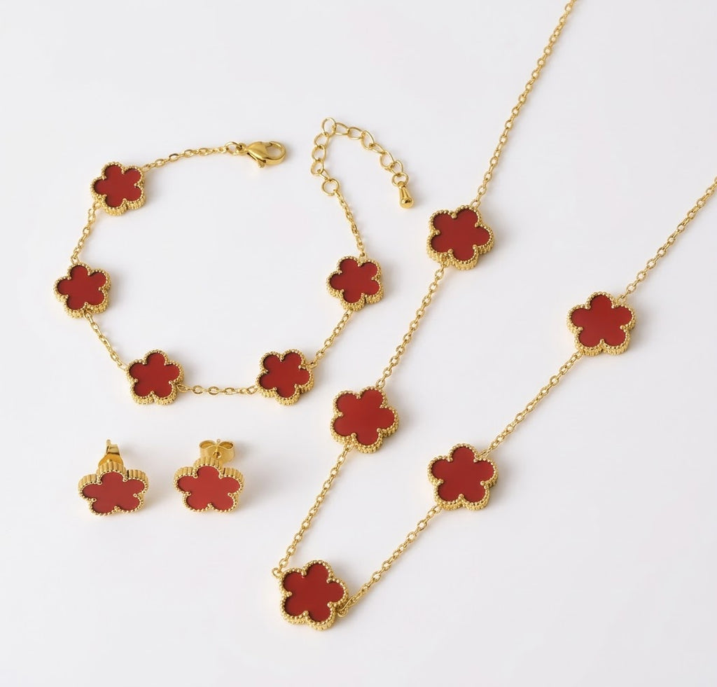 Red clover necklace, bracelet and stud earrings with gold tone settings