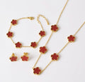 Red clover necklace, bracelet and stud earrings with gold tone settings
