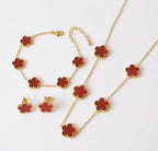 Red clover necklace, bracelet and stud earrings with gold tone settings