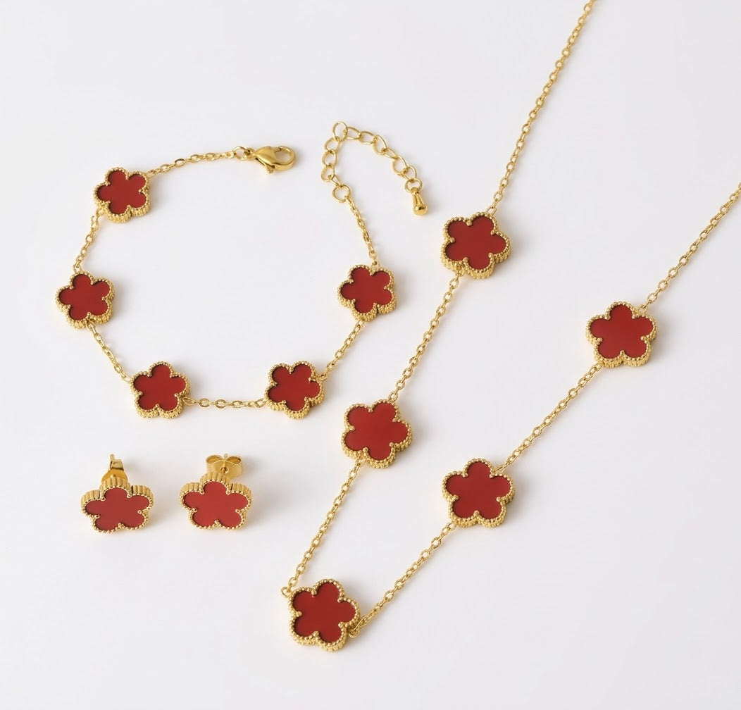 Red clover necklace, bracelet and stud earrings with gold tone settings