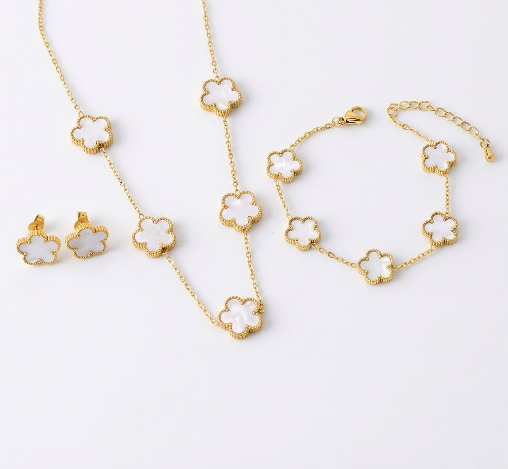 White clover necklace, bracelet and stud earrings with gold tone settings