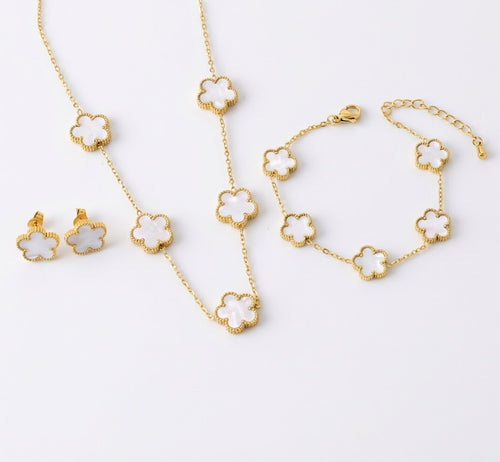 White clover necklace, bracelet and stud earrings with gold tone settings
